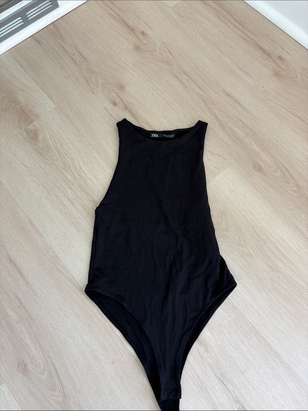 Zara Black Sleeveless One-Piece Bodysuit